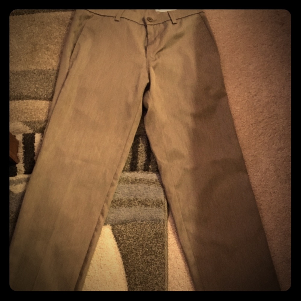 29x30 Haggar performance slacks.